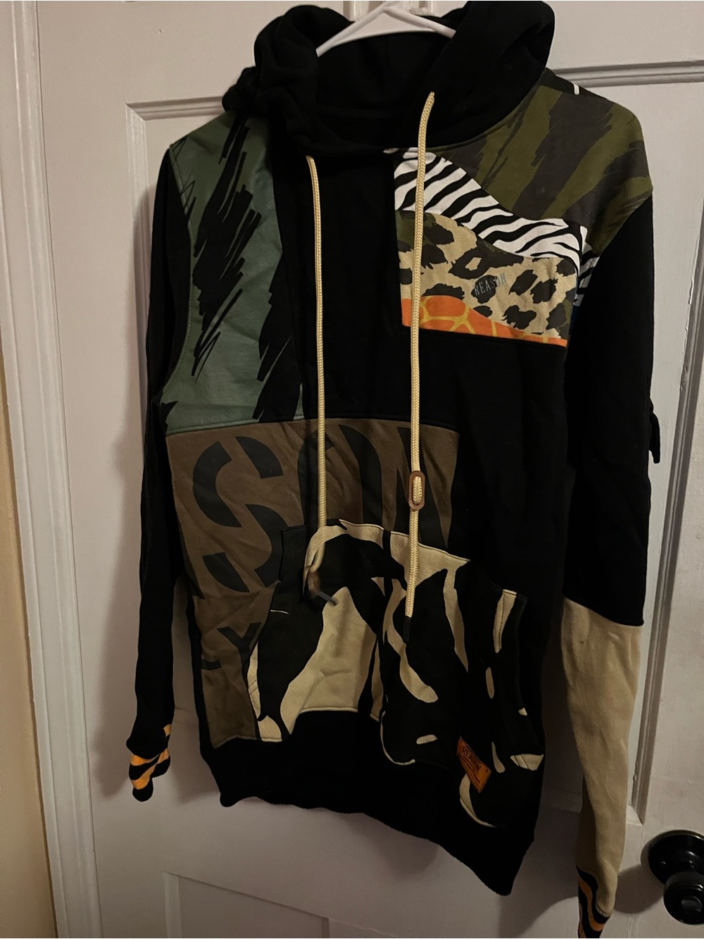 Reason Patchwork Hoodie in Black, Olive & Tan with Animal Print Accents